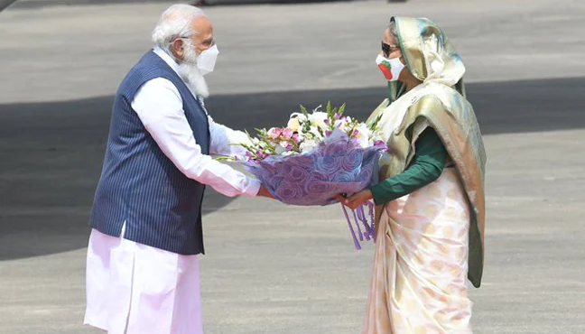 Bangladesh PM Sheikh Hasina welcoming Indian PM Narendra Modi